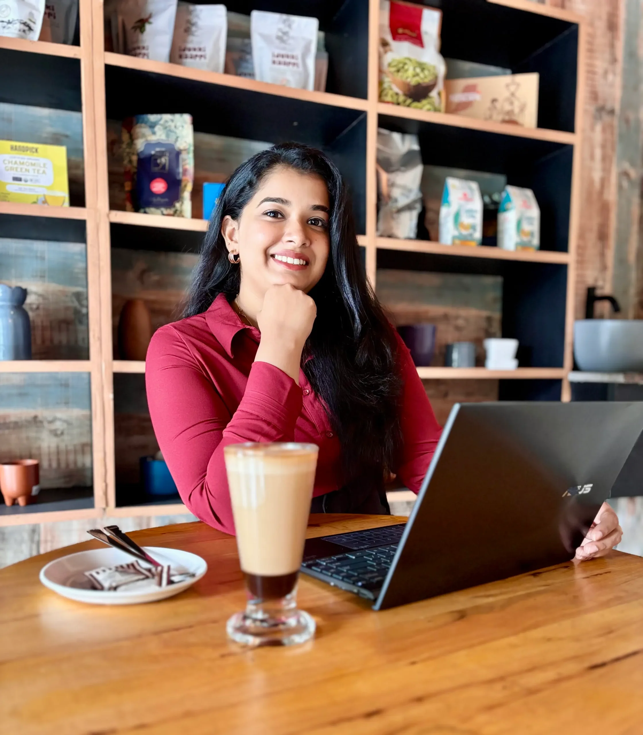 Image of a laptop and coffee in front of the digital marketing expert in Kollam.